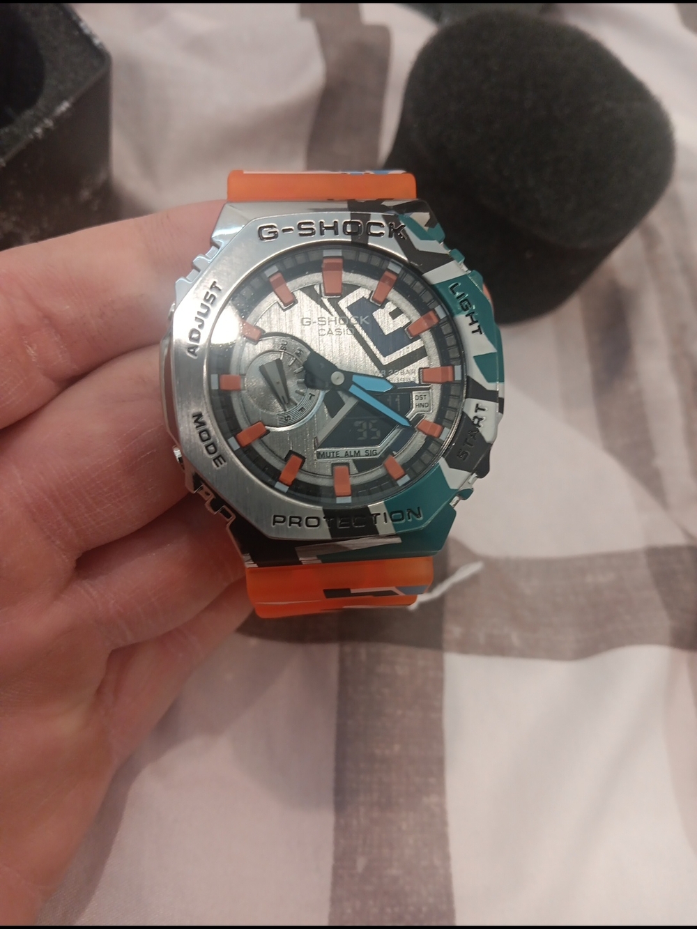 G-Shock Orange Strap Watch with Blue & Black Graphic Accents